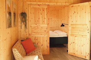 Múlafossur Cottages near Waterfall