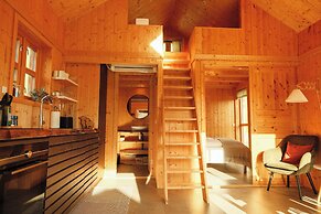 Múlafossur Cottages near Waterfall