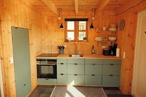 Múlafossur Cottages near Waterfall