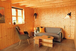 Múlafossur Cottages near Waterfall