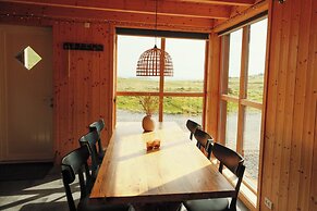 Múlafossur Cottages near Waterfall