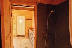 Múlafossur Cottages near Waterfall