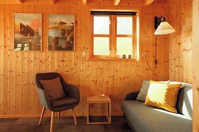 Múlafossur Cottages near Waterfall