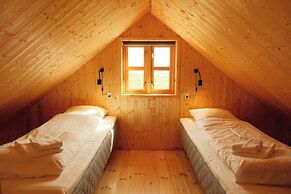 Múlafossur Cottages near Waterfall