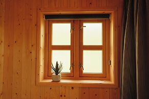 Múlafossur Cottages near Waterfall