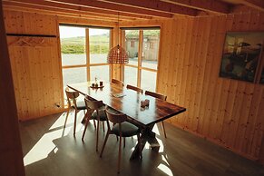 Múlafossur Cottages near Waterfall