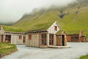 Múlafossur Cottages near Waterfall