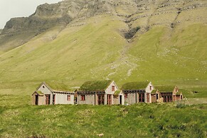 Múlafossur Cottages near Waterfall