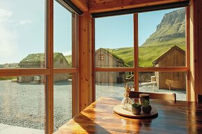 Múlafossur Cottages near Waterfall