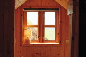 Múlafossur Cottages near Waterfall
