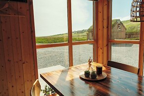 Múlafossur Cottages near Waterfall