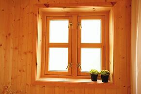 Múlafossur Cottages near Waterfall