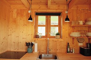 Múlafossur Cottages near Waterfall