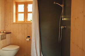 Múlafossur Cottages near Waterfall