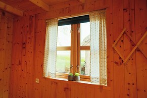 Múlafossur Cottages near Waterfall