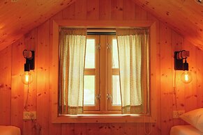 Múlafossur Cottages near Waterfall