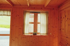 Múlafossur Cottages near Waterfall