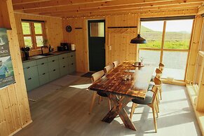 Múlafossur Cottages near Waterfall