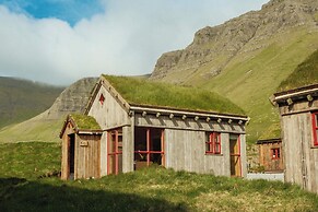 Múlafossur Cottages near Waterfall