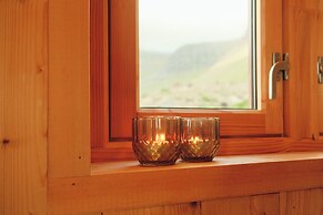 Múlafossur Cottages near Waterfall