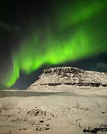 Múlafossur Cottages near Waterfall