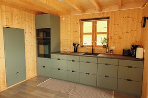 Múlafossur Cottages near Waterfall