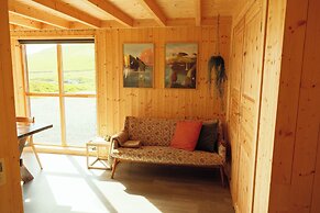 Múlafossur Cottages near Waterfall