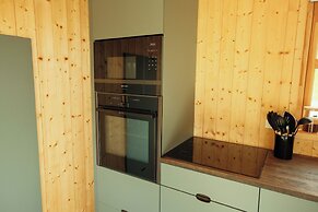 Múlafossur Cottages near Waterfall