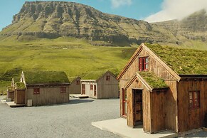 Múlafossur Cottages near Waterfall