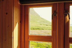 Múlafossur Cottages near Waterfall
