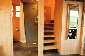 Múlafossur Cottages near Waterfall