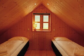 Múlafossur Cottages near Waterfall