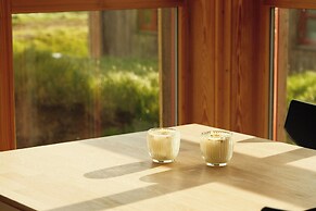 Múlafossur Cottages near Waterfall