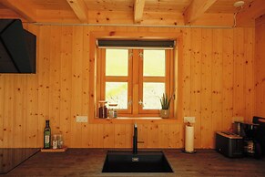 Múlafossur Cottages near Waterfall