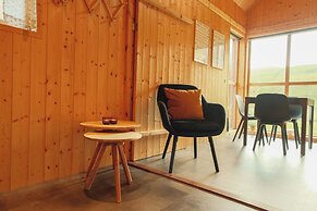 Múlafossur Cottages near Waterfall