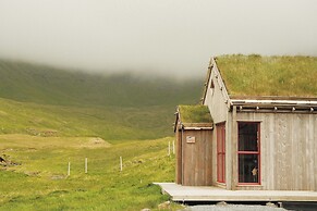 Múlafossur Cottages near Waterfall