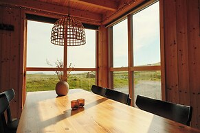 Múlafossur Cottages near Waterfall