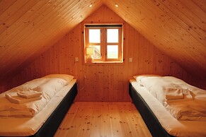 Múlafossur Cottages near Waterfall