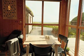 Múlafossur Cottages near Waterfall