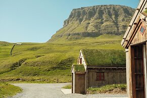 Múlafossur Cottages near Waterfall