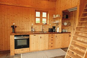 Múlafossur Cottages near Waterfall