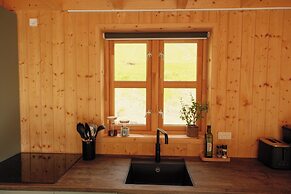 Múlafossur Cottages near Waterfall