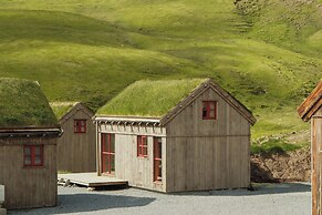 Múlafossur Cottages near Waterfall