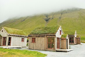 Múlafossur Cottages near Waterfall