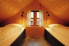 Múlafossur Cottages near Waterfall