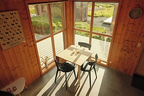 Múlafossur Cottages near Waterfall