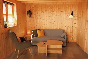 Múlafossur Cottages near Waterfall