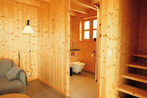 Múlafossur Cottages near Waterfall