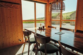 Múlafossur Cottages near Waterfall