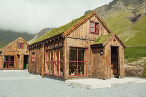 Múlafossur Cottages near Waterfall